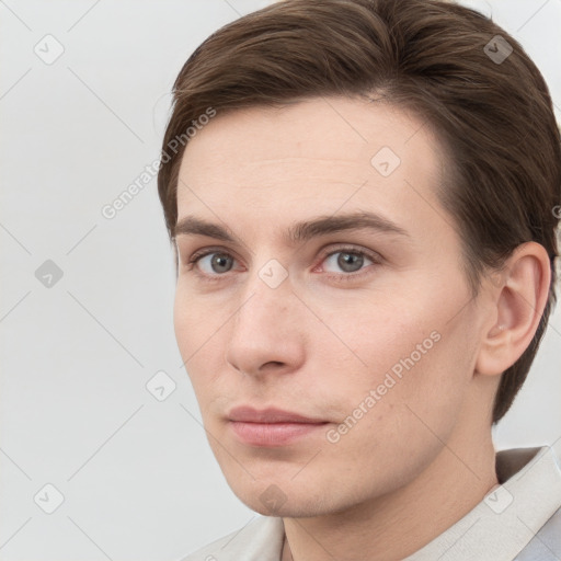 Neutral white young-adult male with short  brown hair and grey eyes