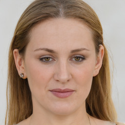 Joyful white young-adult female with medium  brown hair and blue eyes