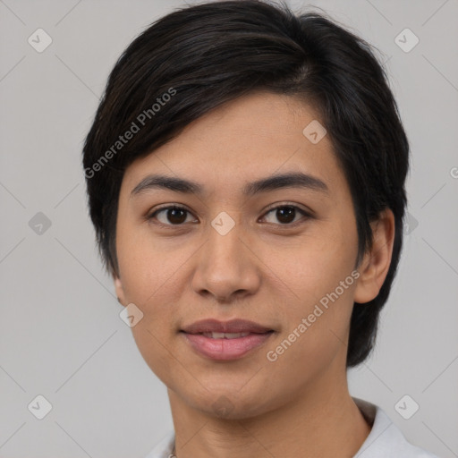 Joyful asian young-adult female with short  brown hair and brown eyes