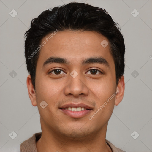 Joyful asian young-adult male with short  brown hair and brown eyes