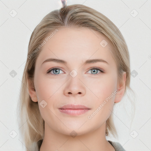 Joyful white young-adult female with medium  brown hair and blue eyes