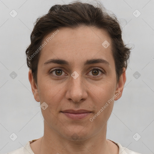 Joyful white adult female with short  brown hair and brown eyes