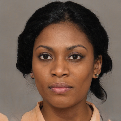 Neutral black young-adult female with medium  black hair and brown eyes
