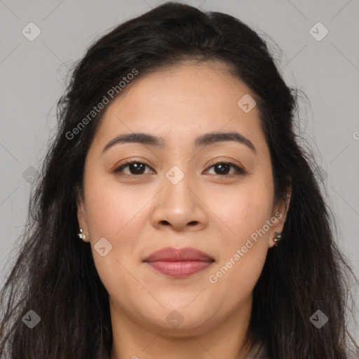 Joyful latino young-adult female with long  brown hair and brown eyes