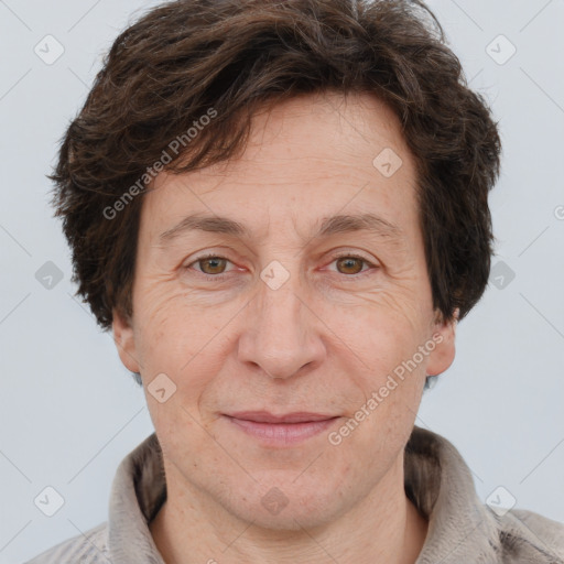 Joyful white adult male with short  brown hair and grey eyes