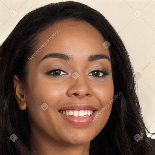 Joyful latino young-adult female with long  black hair and brown eyes