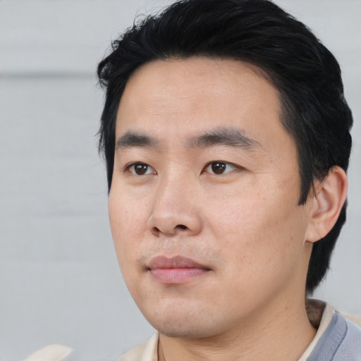 Neutral asian young-adult male with short  black hair and brown eyes