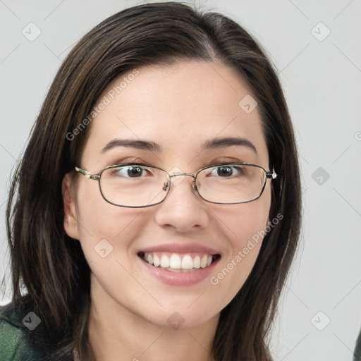 Joyful white young-adult female with medium  brown hair and green eyes