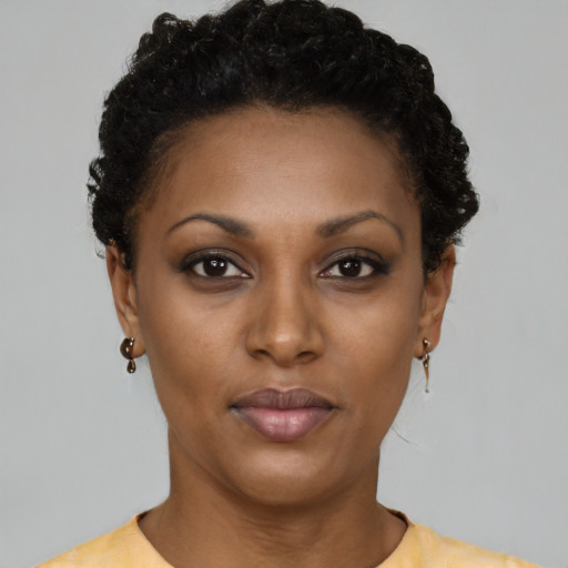 Neutral black young-adult female with short  brown hair and brown eyes