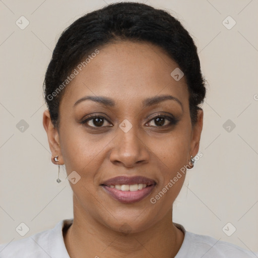 Joyful latino young-adult female with short  brown hair and brown eyes