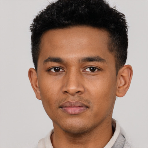 Neutral latino young-adult male with short  black hair and brown eyes