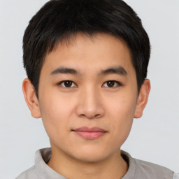 Neutral asian young-adult male with short  brown hair and brown eyes