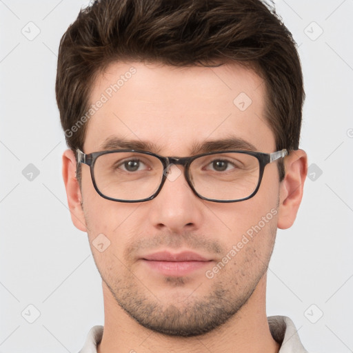 Neutral white young-adult male with short  brown hair and brown eyes