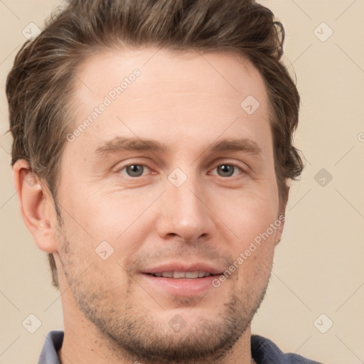 Joyful white adult male with short  brown hair and grey eyes