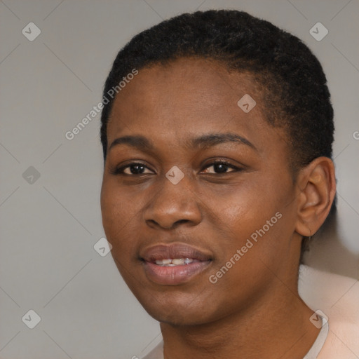 Joyful black young-adult female with short  black hair and brown eyes