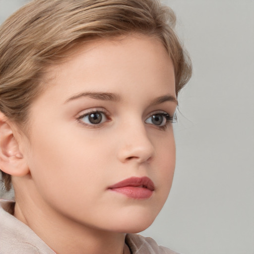 Neutral white child female with short  brown hair and brown eyes