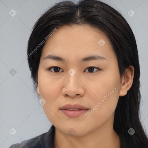 Joyful asian young-adult female with medium  black hair and brown eyes