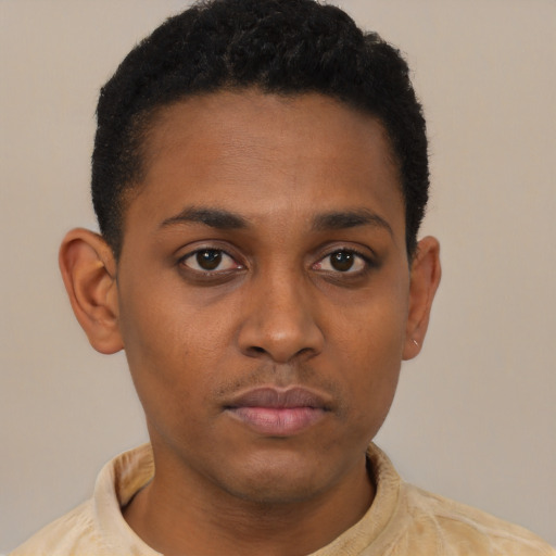 Neutral latino young-adult male with short  brown hair and brown eyes