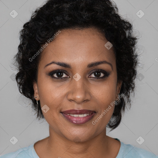 Joyful black young-adult female with medium  brown hair and brown eyes