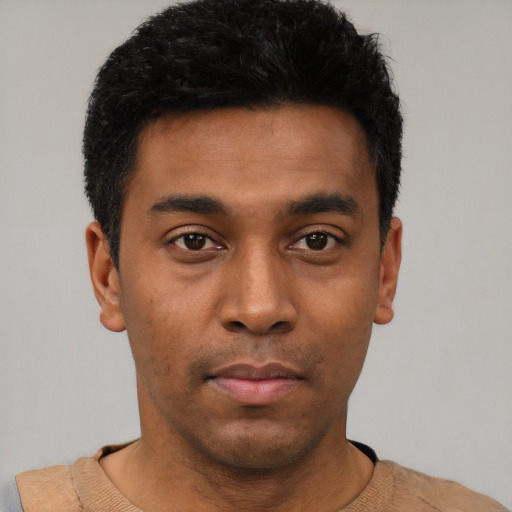 Neutral black young-adult male with short  black hair and brown eyes