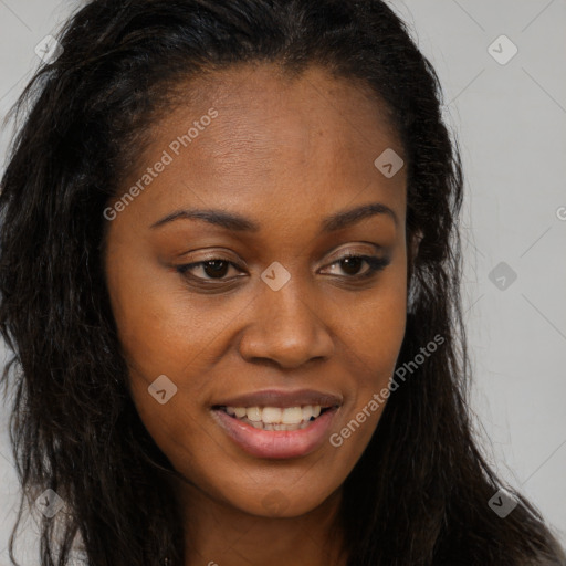 Joyful black young-adult female with long  brown hair and brown eyes