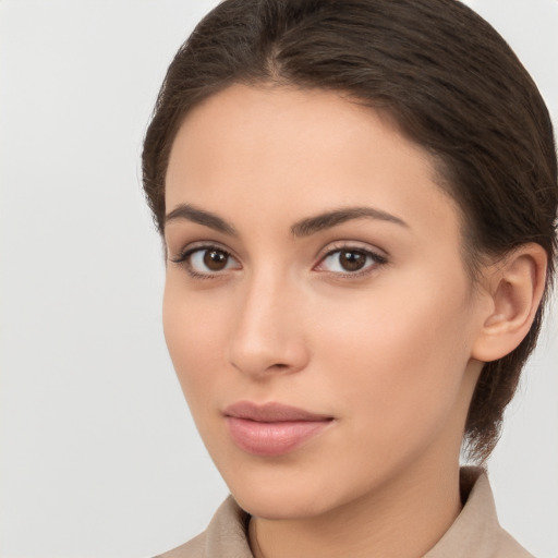 Neutral white young-adult female with long  brown hair and brown eyes