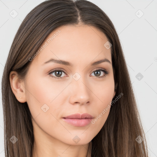 Neutral white young-adult female with long  brown hair and brown eyes