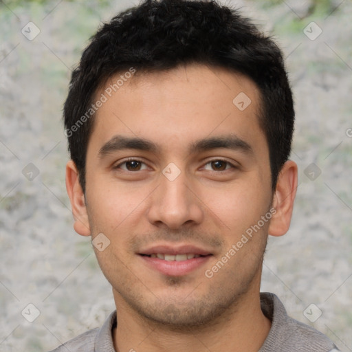 Joyful white young-adult male with short  black hair and brown eyes