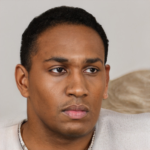 Neutral latino young-adult male with short  brown hair and brown eyes