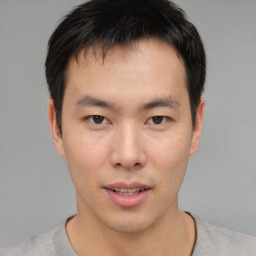 Neutral asian young-adult male with short  brown hair and brown eyes