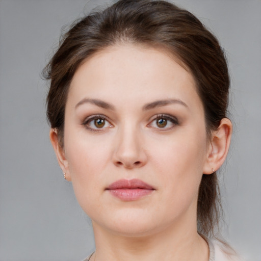 Neutral white young-adult female with medium  brown hair and brown eyes