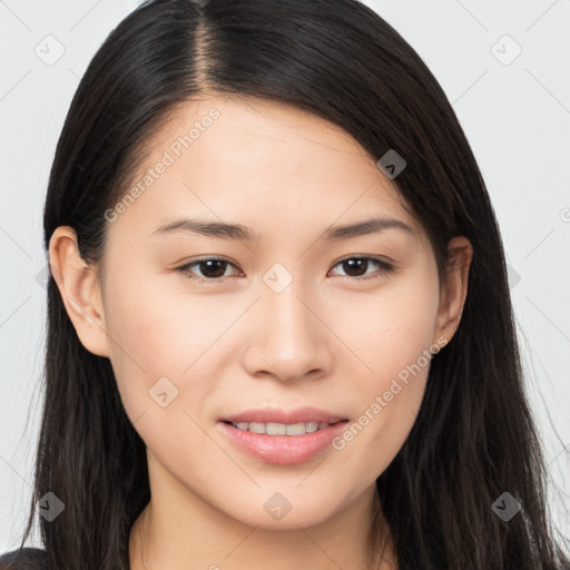 Joyful asian young-adult female with long  brown hair and brown eyes