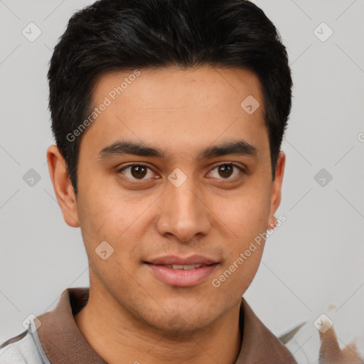 Joyful latino young-adult male with short  brown hair and brown eyes