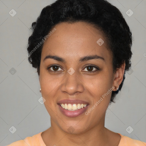 Joyful latino young-adult female with short  black hair and brown eyes