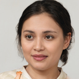 Joyful white young-adult female with medium  brown hair and brown eyes