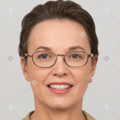 Joyful white adult female with short  brown hair and grey eyes