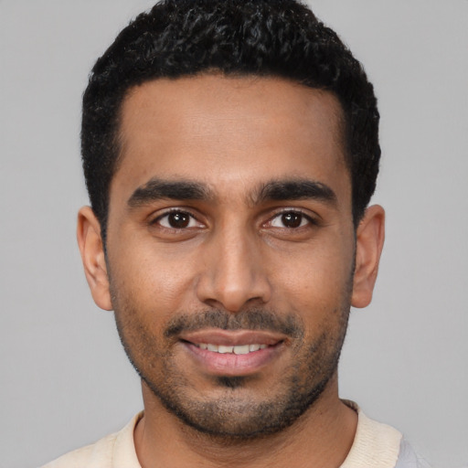 Neutral latino young-adult male with short  black hair and brown eyes