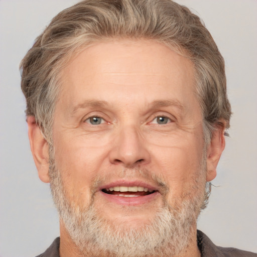 Joyful white middle-aged male with short  brown hair and brown eyes