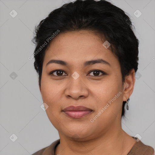 Joyful latino young-adult female with short  brown hair and brown eyes