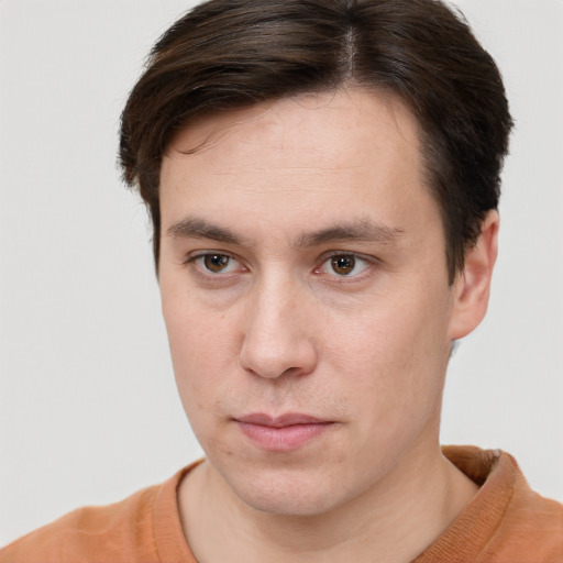 Neutral white young-adult male with short  brown hair and brown eyes