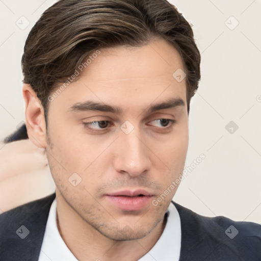 Neutral white young-adult male with short  brown hair and brown eyes