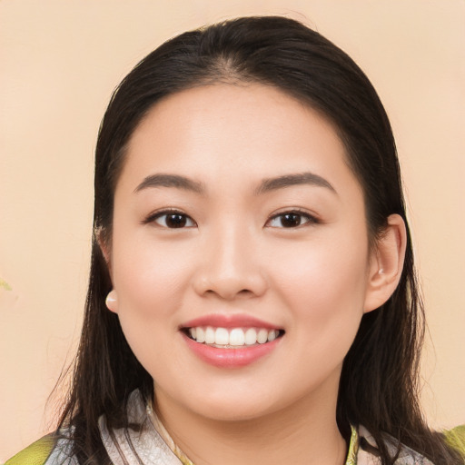 Joyful white young-adult female with medium  black hair and brown eyes