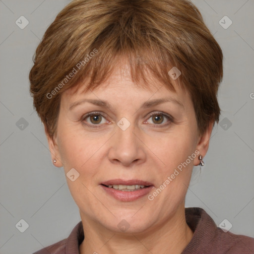 Joyful white adult female with medium  brown hair and grey eyes