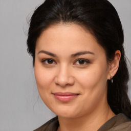 Joyful white young-adult female with medium  brown hair and brown eyes