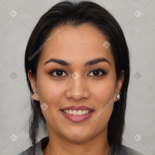 Joyful latino young-adult female with medium  brown hair and brown eyes