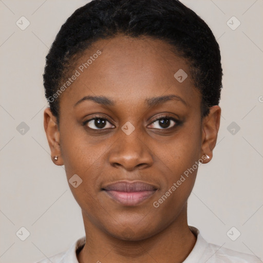 Joyful black young-adult female with short  black hair and brown eyes