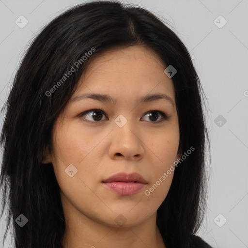 Joyful asian young-adult female with long  brown hair and brown eyes