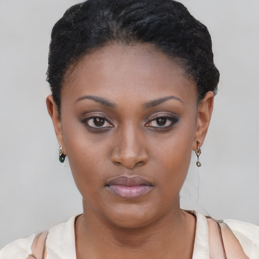Neutral black young-adult female with short  black hair and brown eyes