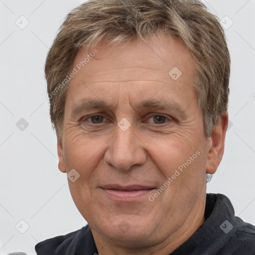 Joyful white middle-aged male with short  brown hair and brown eyes