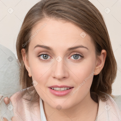 Joyful white young-adult female with medium  brown hair and blue eyes